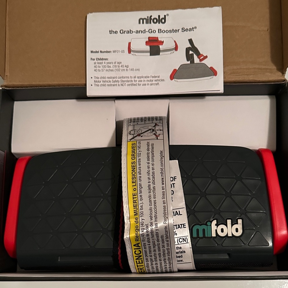 Mifold Grab-And-Go Compact Car
Booster Portable
Seat Black / Red Traveling Seat